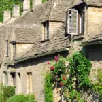 Stone cottages in an English Cotswolds village, typical of UK holiday rental properties